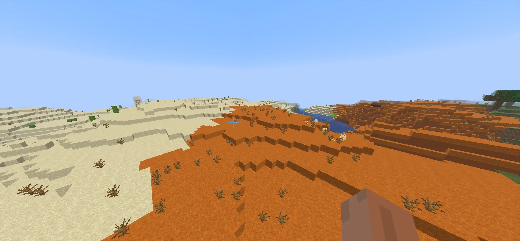 Minecraft badlands mesa biome with colorful orange red yellow terracotta striped cliffs