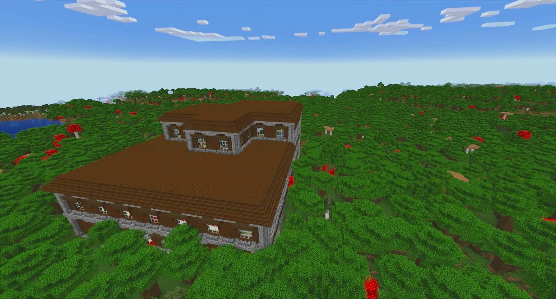 Minecraft dark forest biome with thick canopy and woodland mansion structure