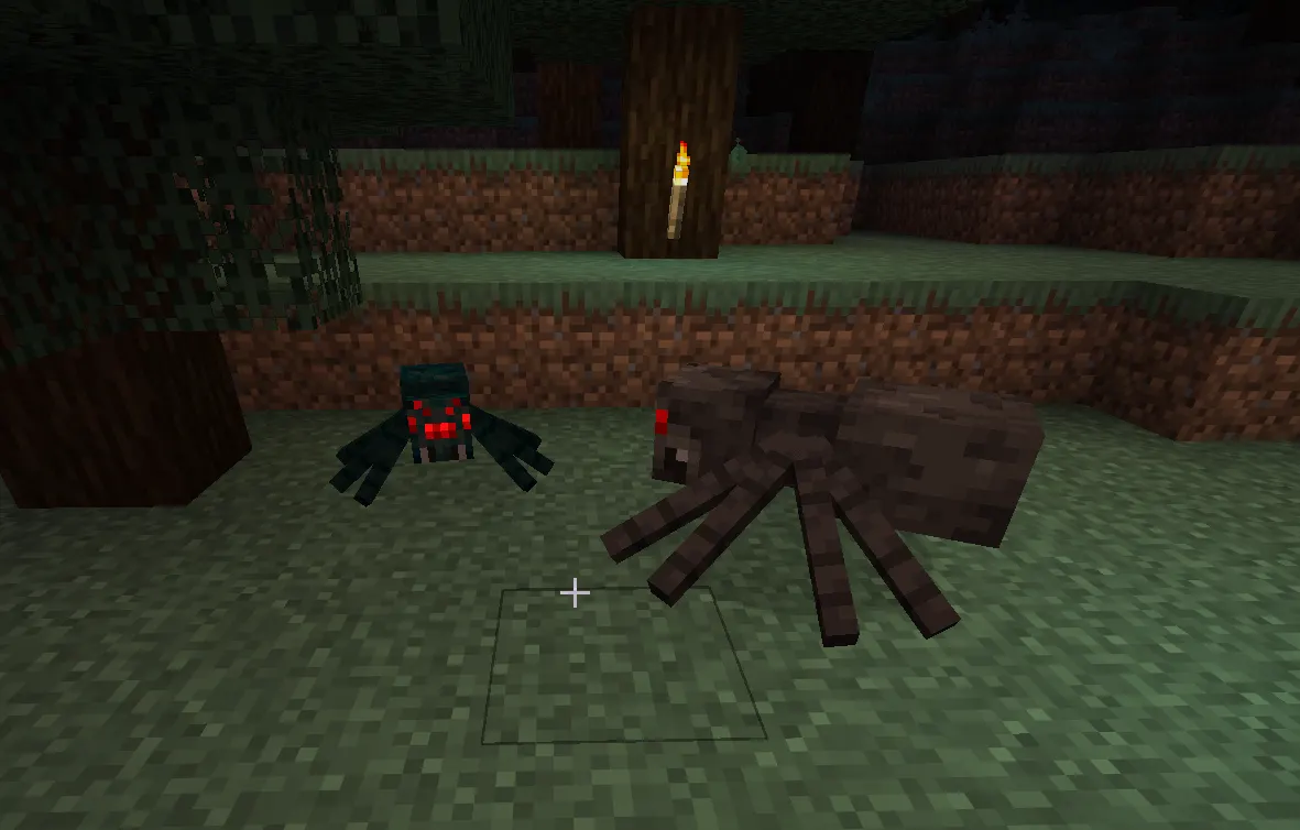 Close-up of Minecraft spider showing red glowing eyes in dark cave