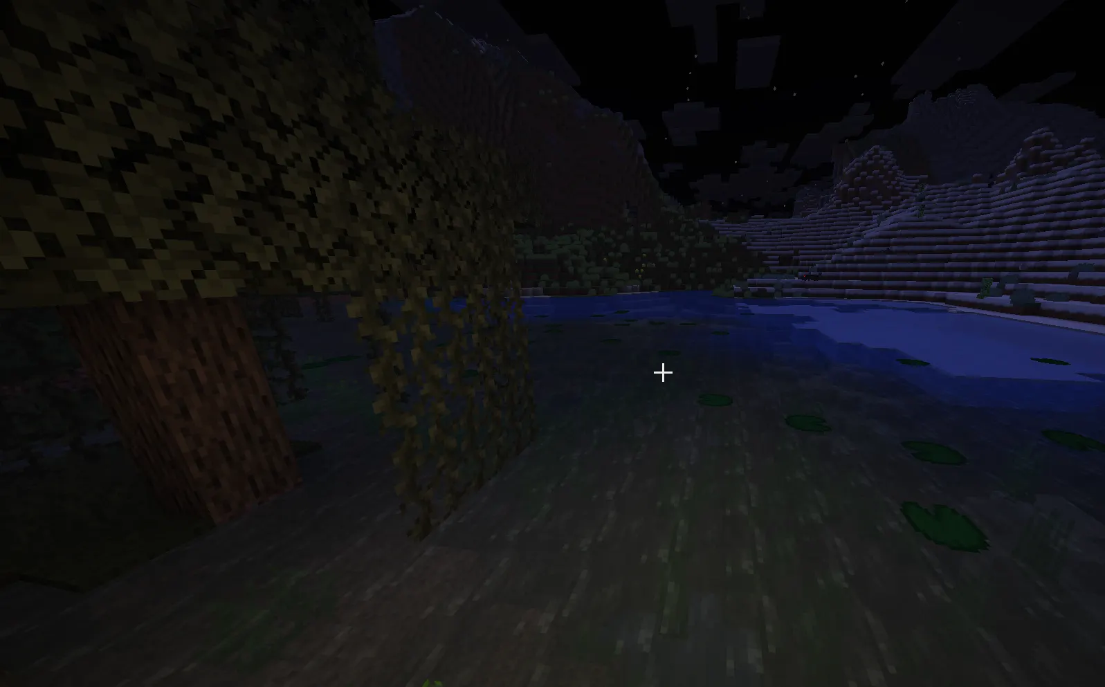  Overview of swamp biome terrain in Minecraft with water, vines, and lily pads