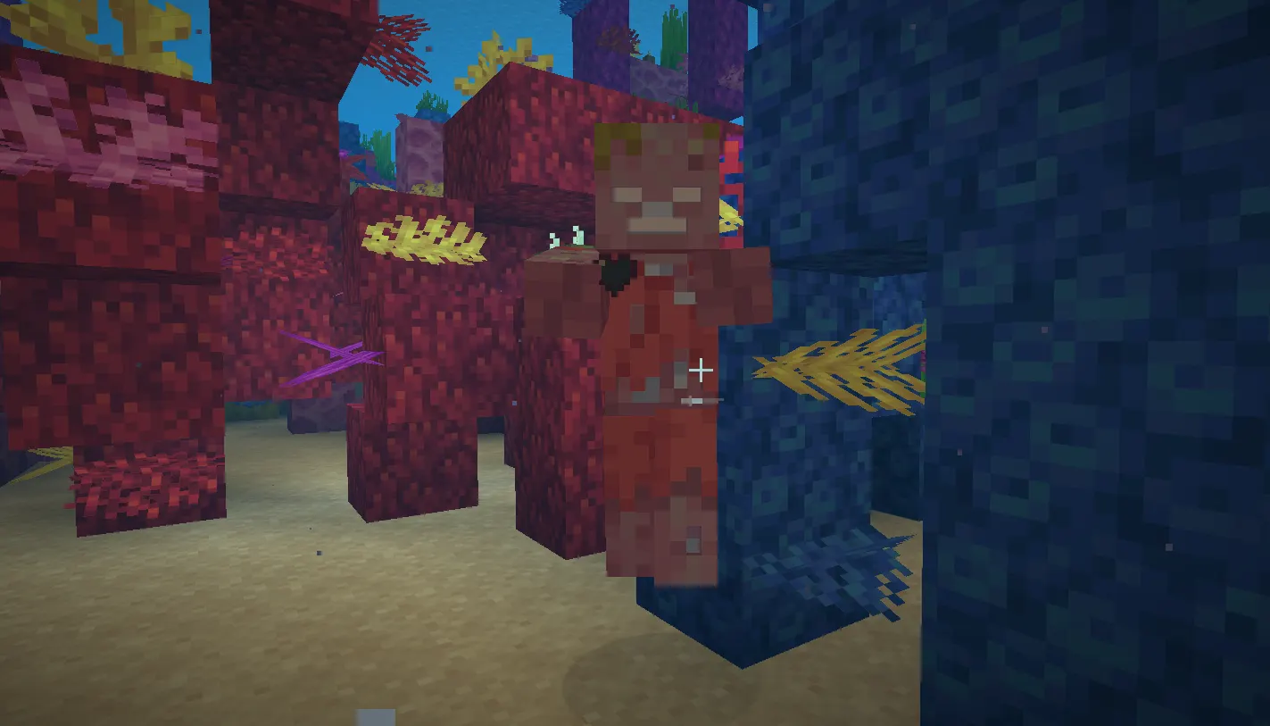 Drowned with a trident attacking underwater in Minecraft