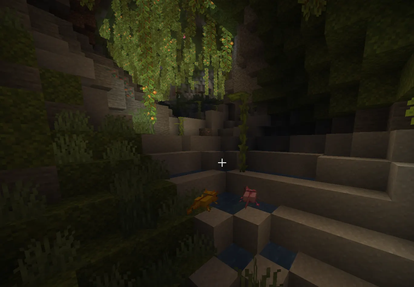 Minecraft lush caves biome with axolotls and glow berries
