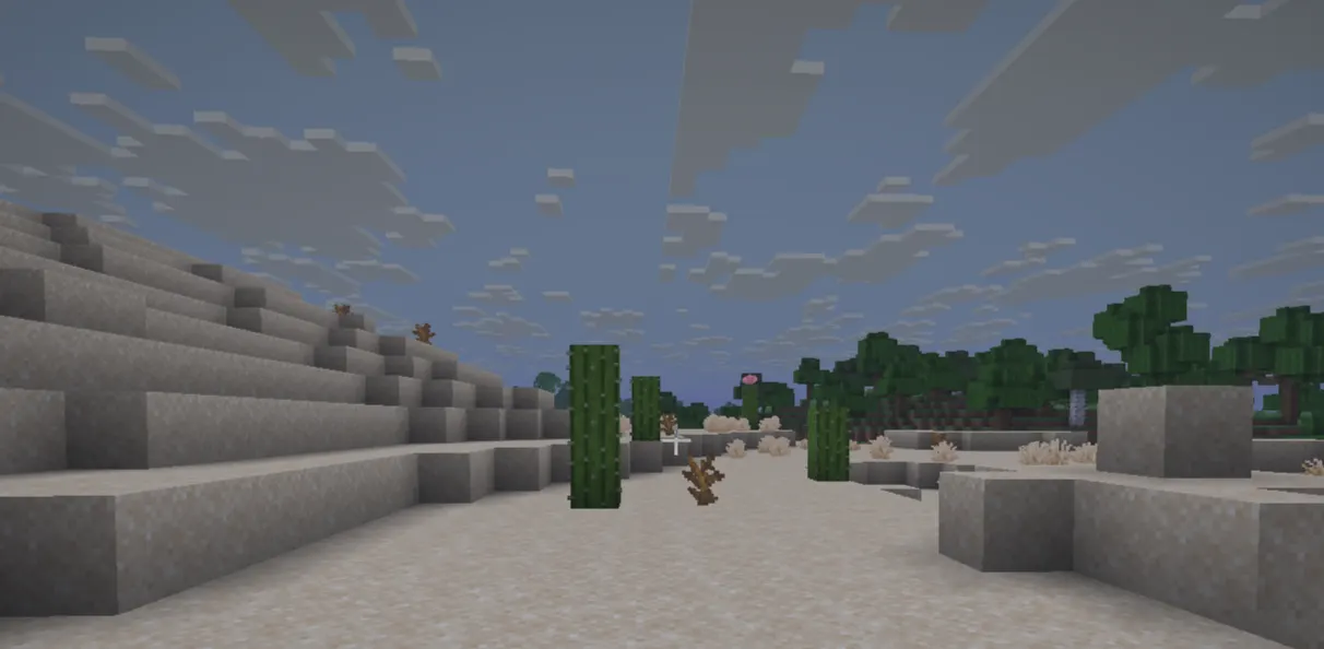 Aerial view of Minecraft desert biome showing dunes, cactus, and temple structure