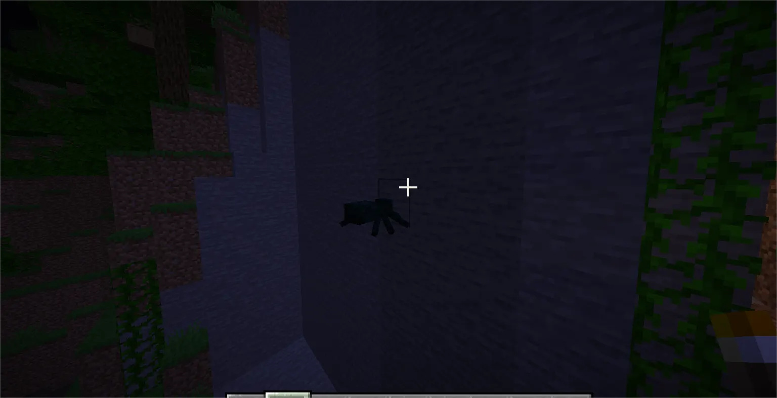 Spider climbing vertical wall in Minecraft showing why walls alone don’t stop mobs