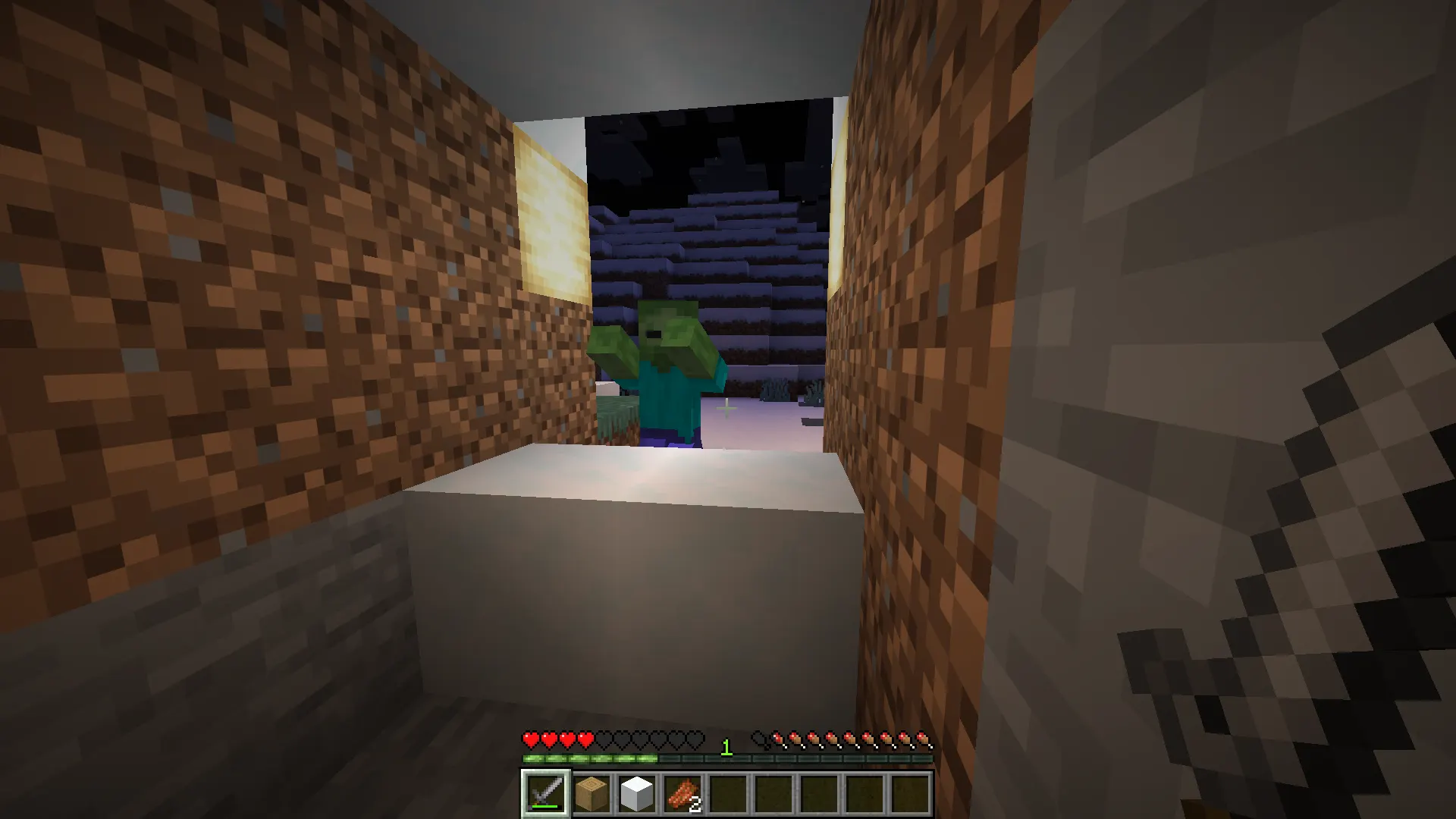 Player attacking zombies safely through small tunnel gap in Minecraft