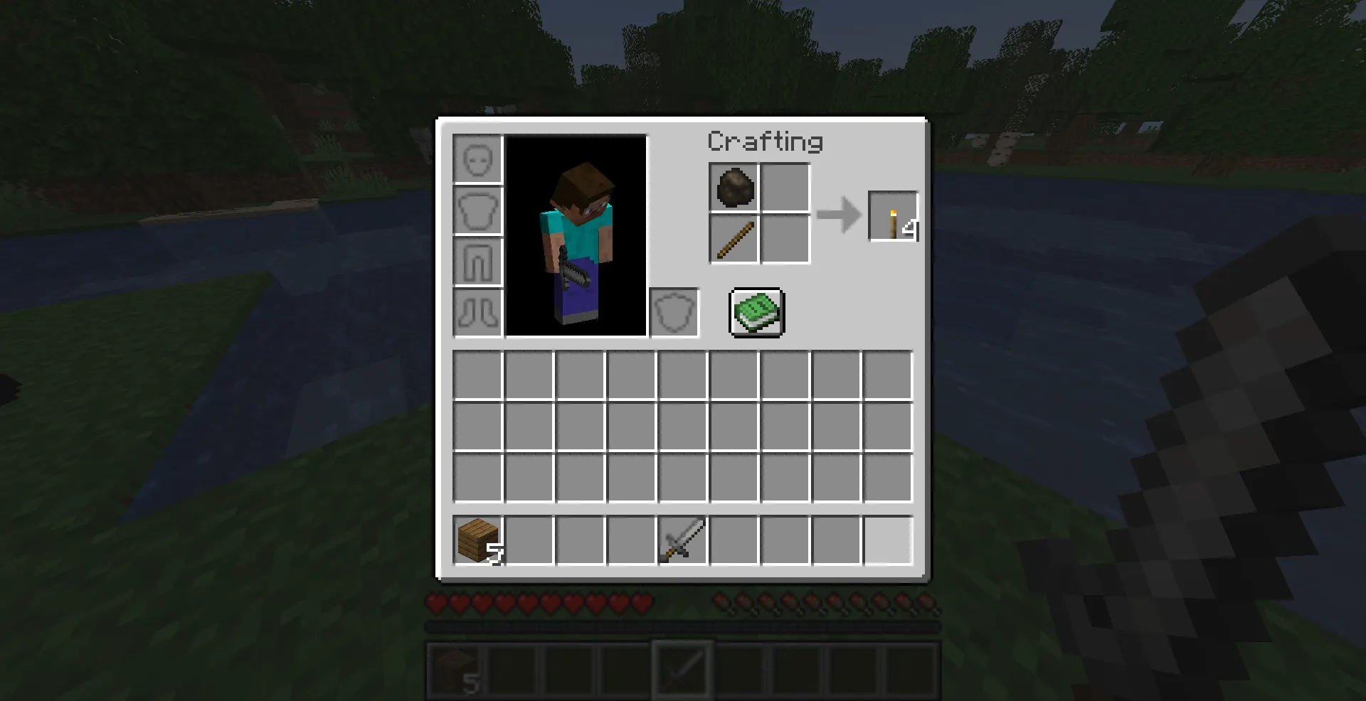 Minecraft torches lighting up a beginner survival shelter at night