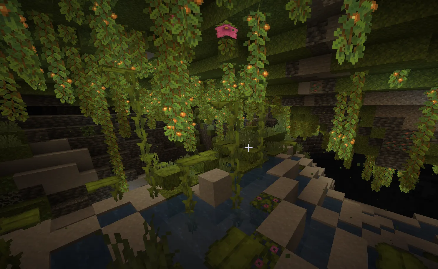  Inside lush caves biome with moss, vines, and glow berries in Minecraft