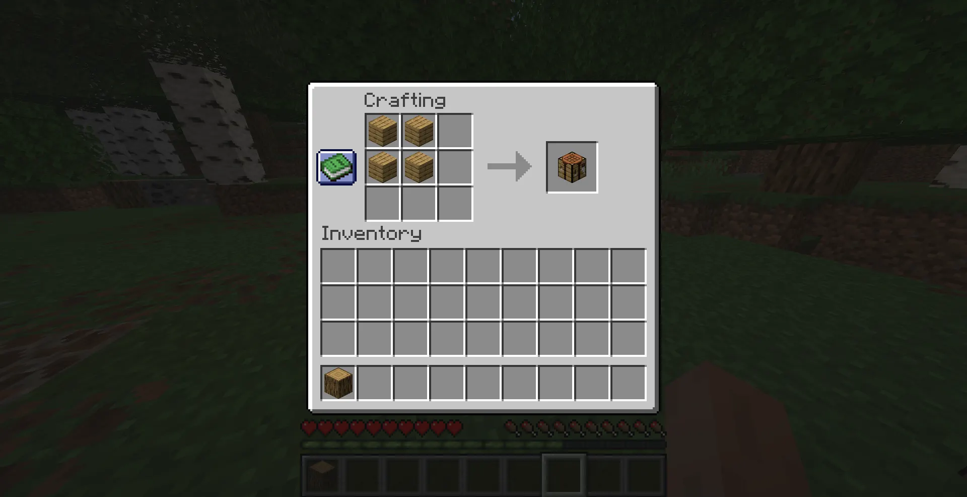 Minecraft crafting table recipe using four wooden planks in the 2x2 crafting grid