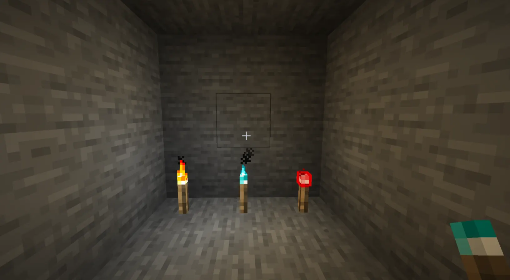 Comparison of regular torch soul torch and redstone torch in Minecraft
