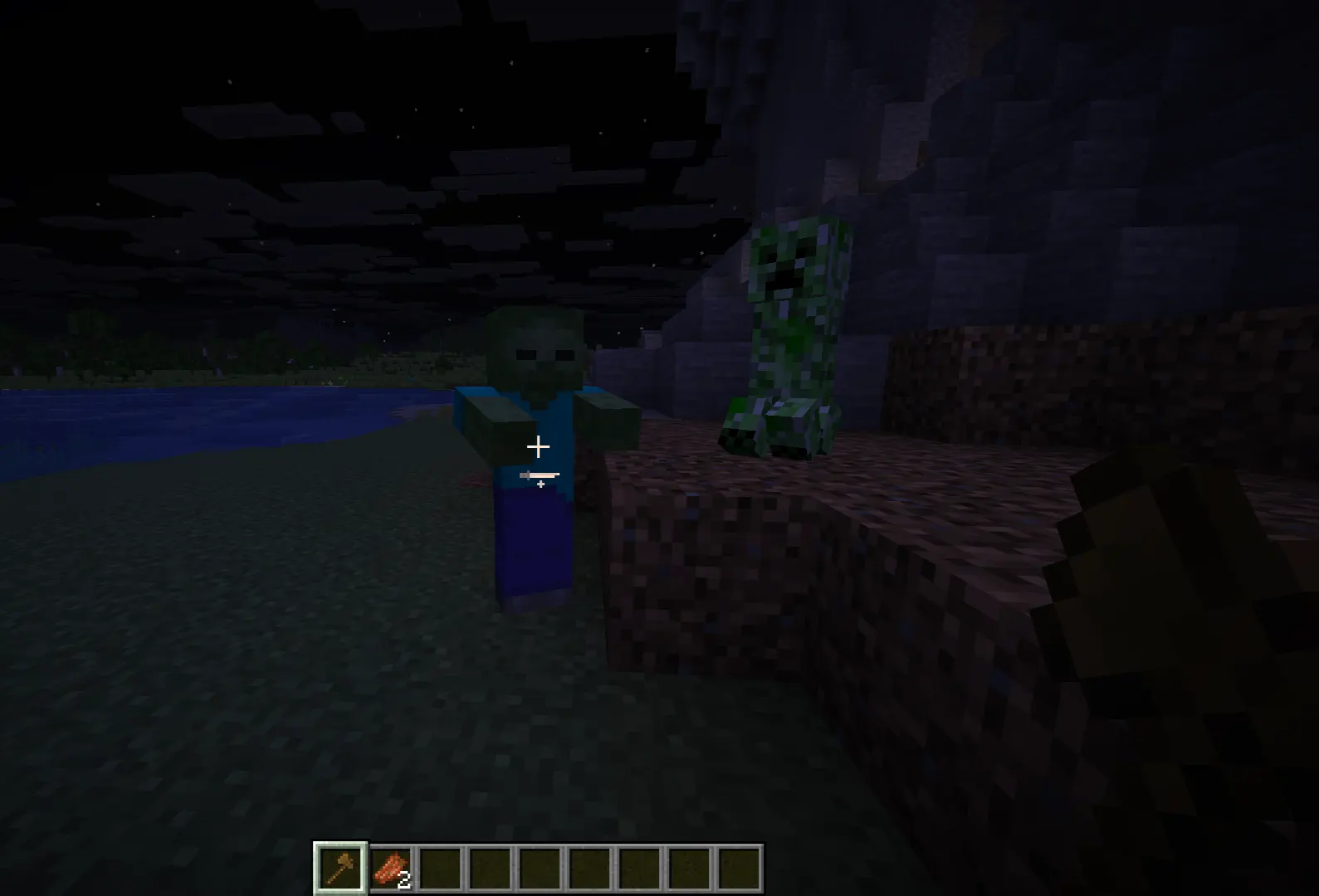 A Minecraft player using a stone axe against a zombie at night