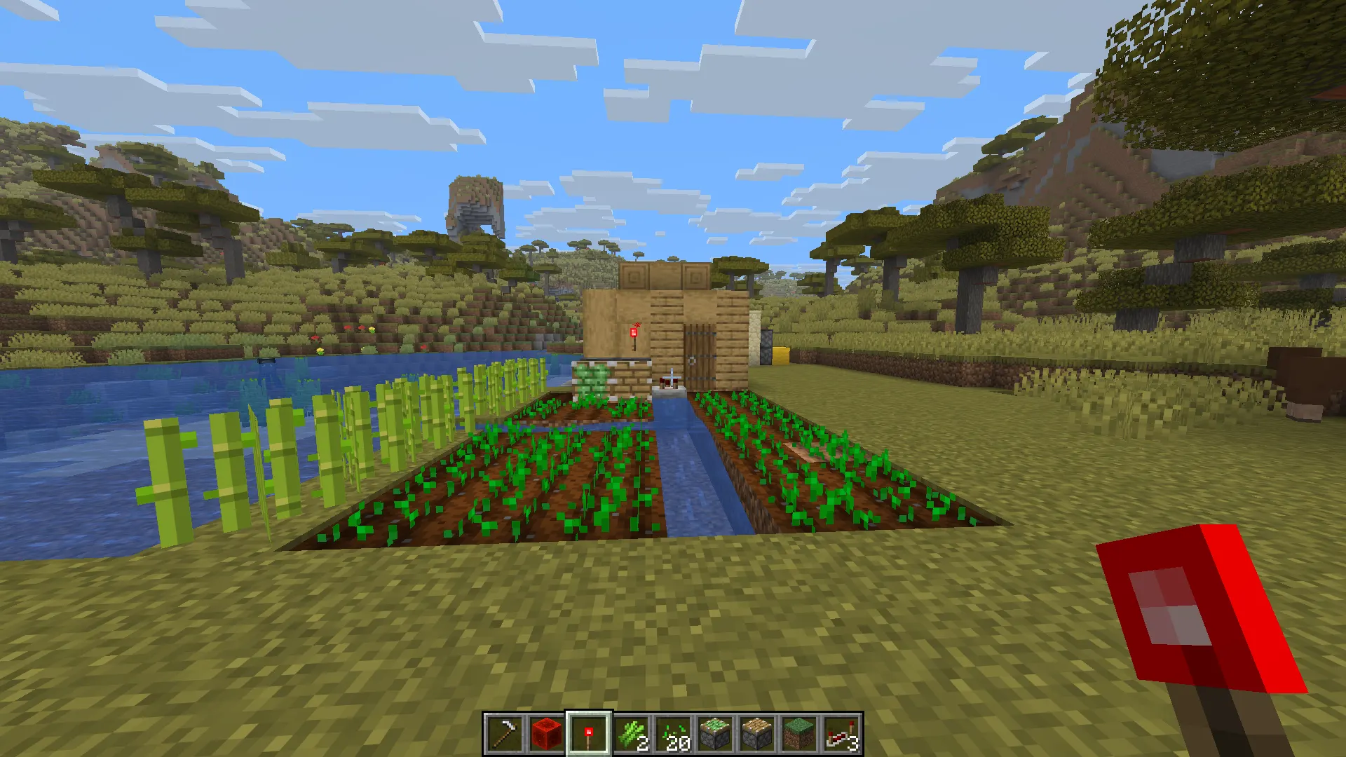 "Minecraft automatic redstone farm harvesting crops using pistons and water collection system"