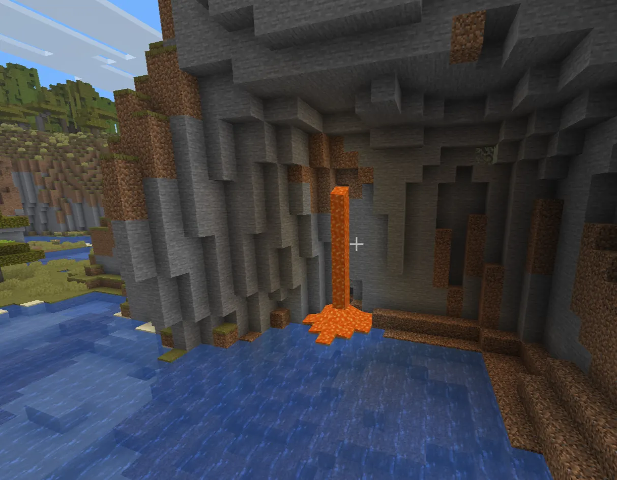 Minecraft ravine with exposed iron ore veins