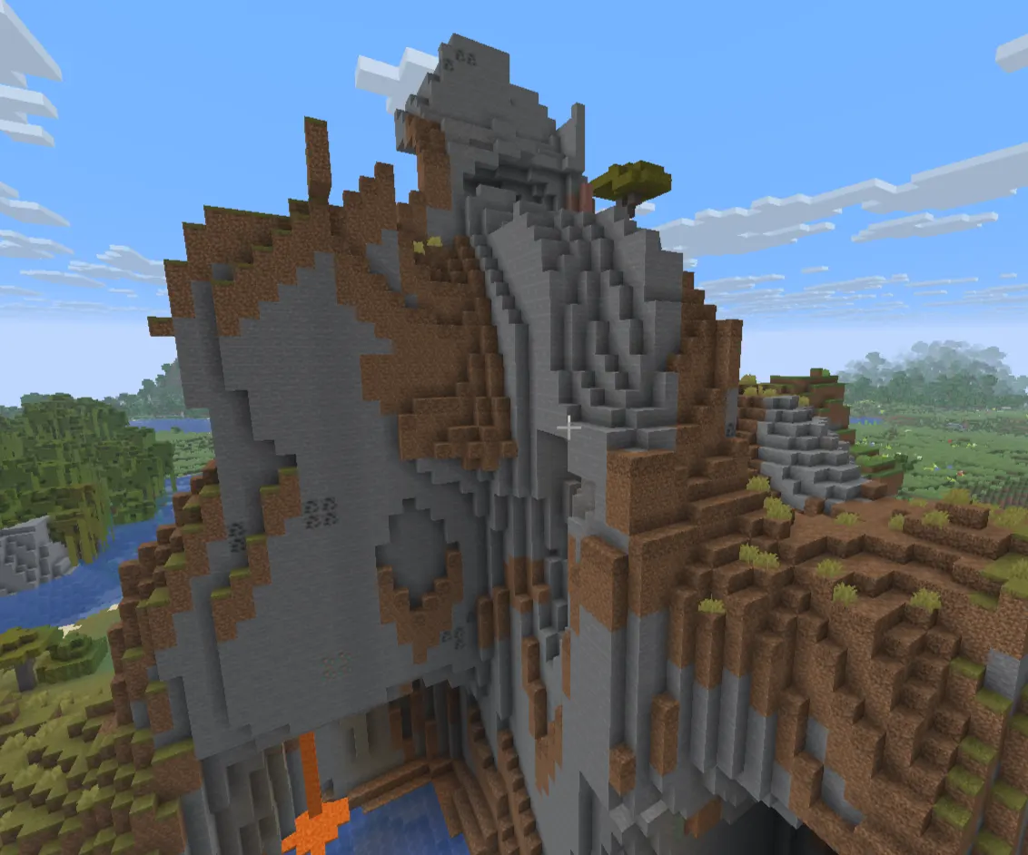 Exposed iron ore on mountain cliffs in Minecraft