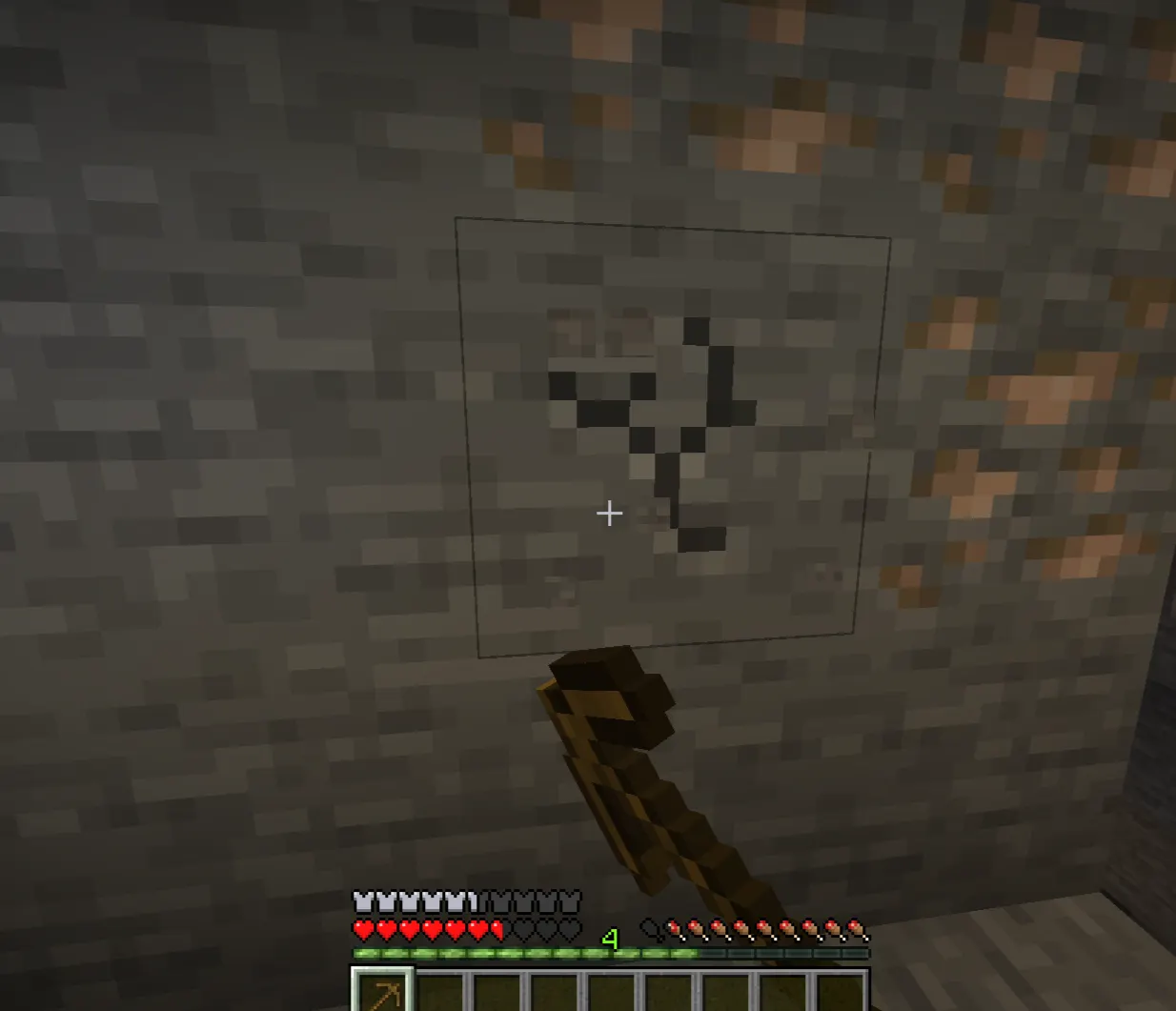 A Minecraft beginner using broken wooden tools near iron ore