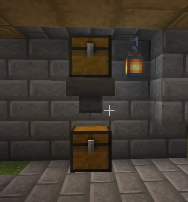 Basic Minecraft hopper system transferring items between chests