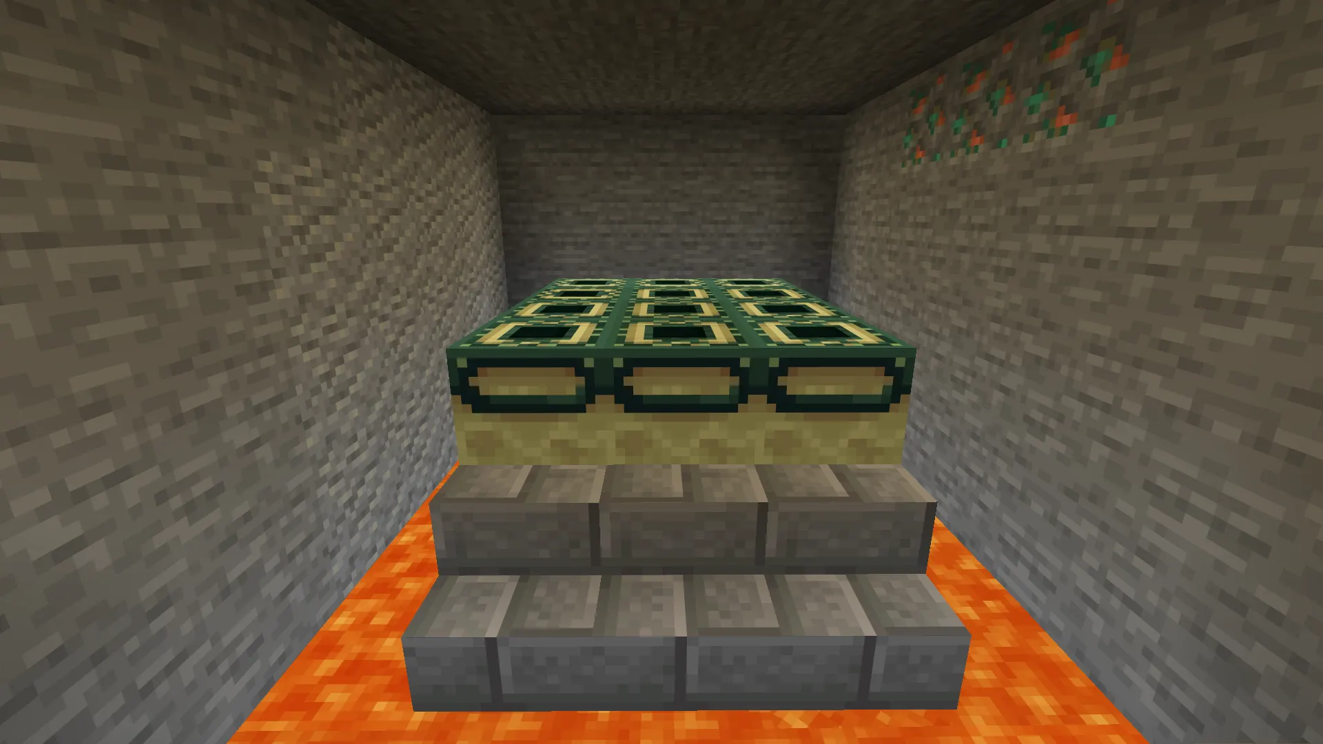A dramatic portal room with lava, silverfish spawner, and portal frame clearly visible.