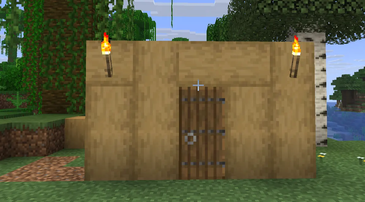 Simple Minecraft starter house built before the first night