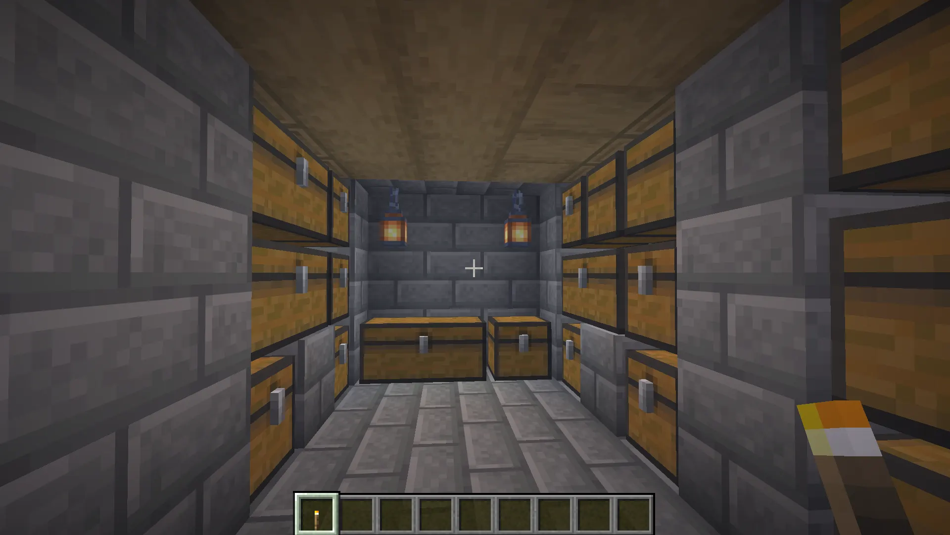 Medium-sized Minecraft survival storage room with organized chest sections