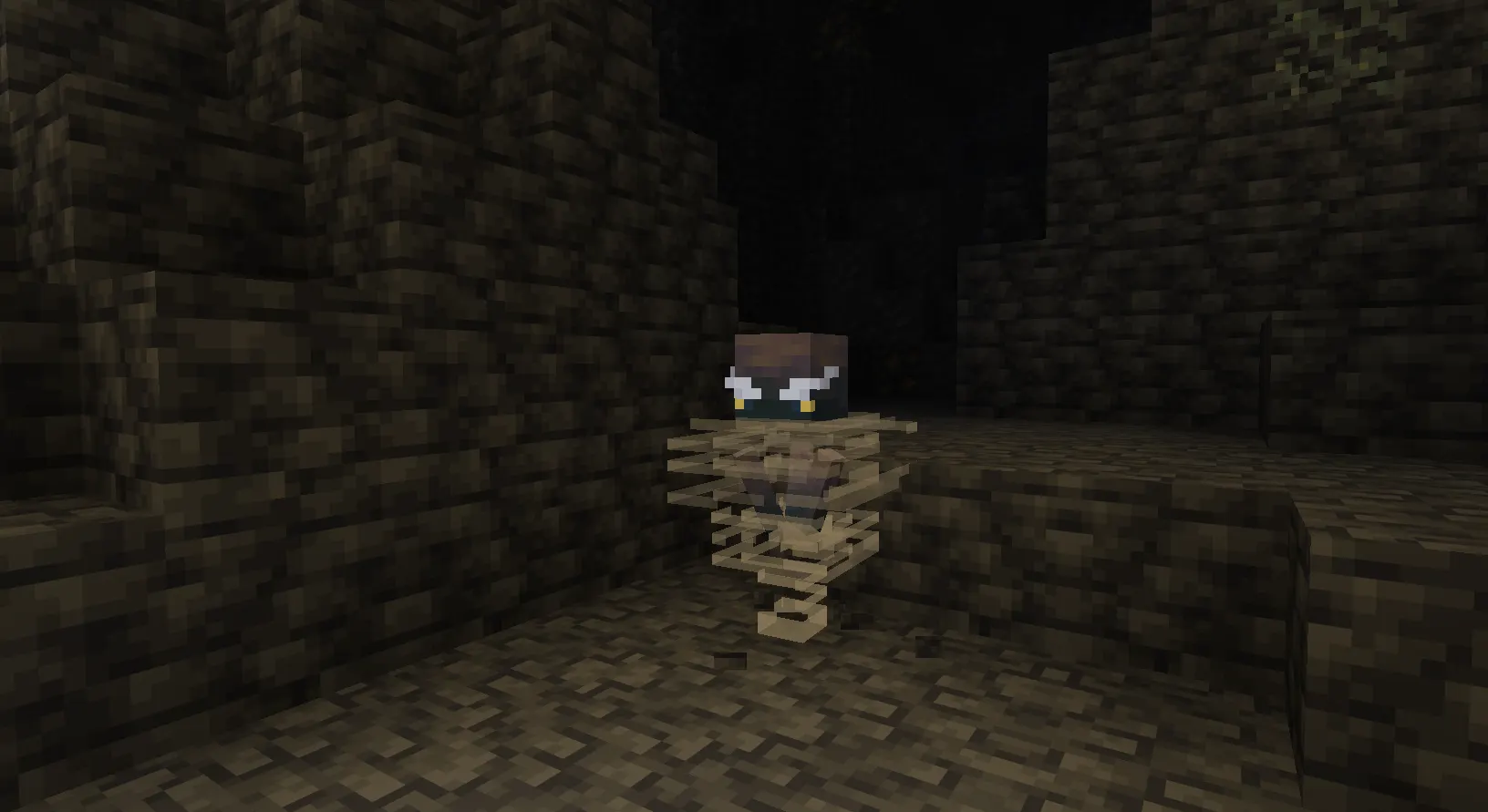 Player using a Wind Charge for movement in Minecraft