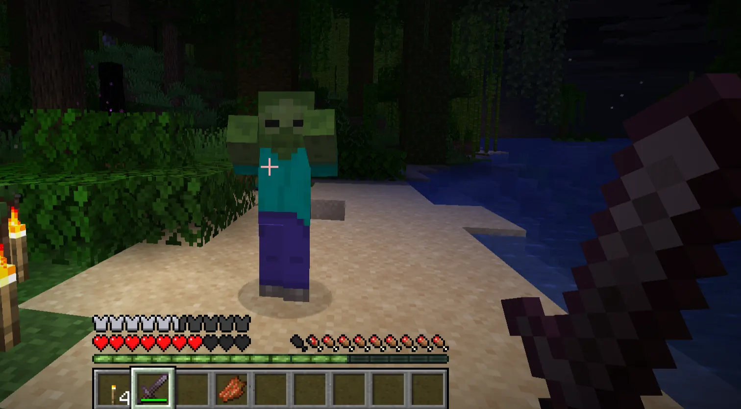 Sharpness V sword fighting mobs in Minecraft