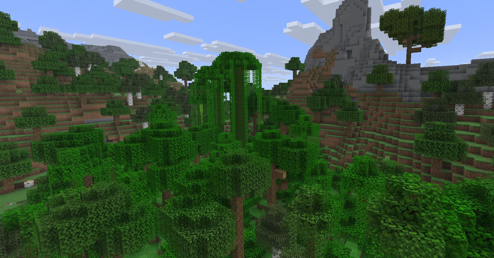 Minecraft Jungle biome with tall jungle trees, vines, bamboo, and dense vegetation