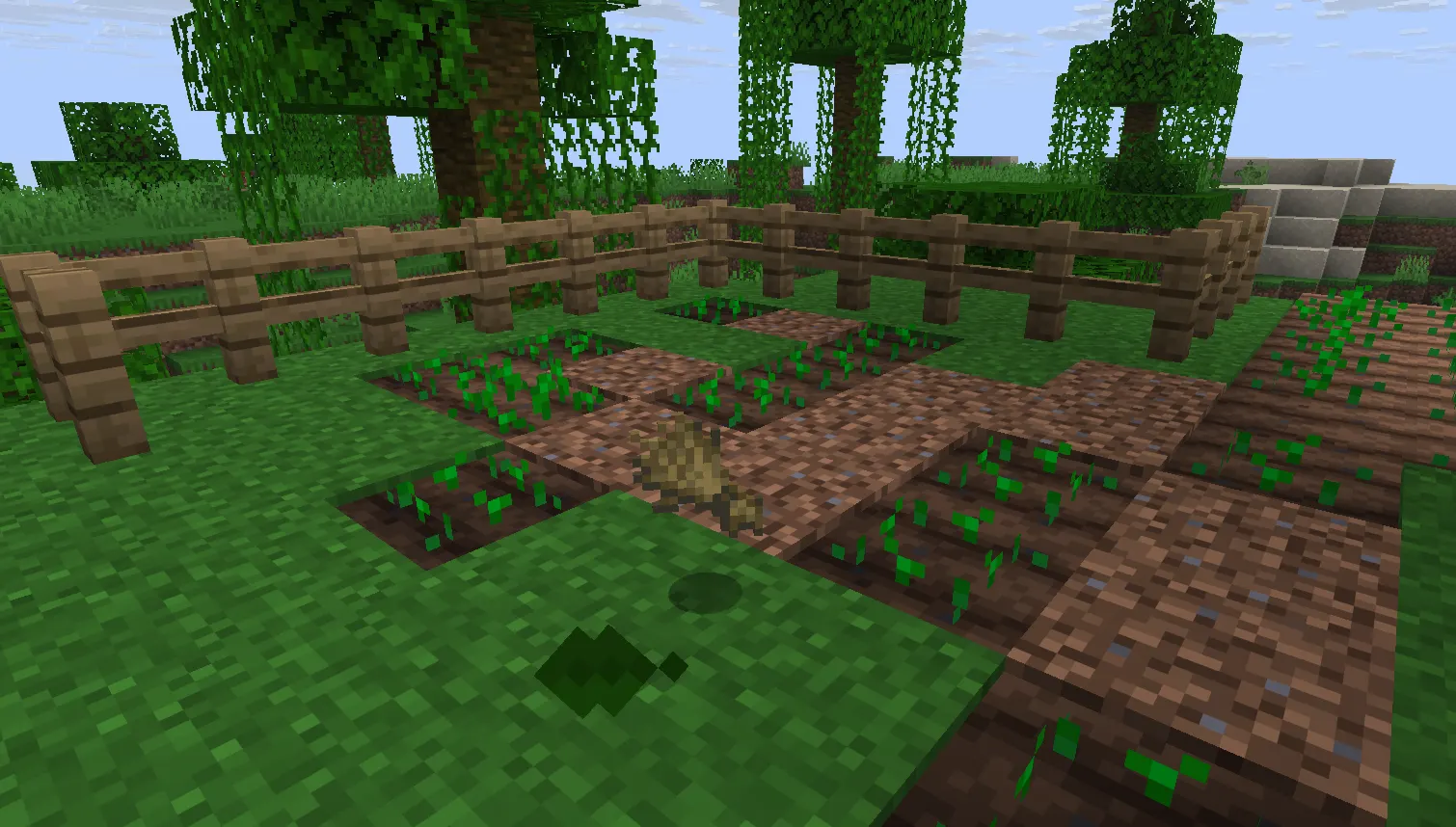  Farmer villager harvesting and replanting wheat in Minecraft